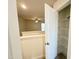 Hallway view shows a walk-in pantry with wire shelves for optimal organization at 26 Twin Birch Dr, Angier, NC 27501