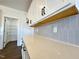 Kitchen counter and backsplash with a view of the pantry at 26 Twin Birch Dr, Angier, NC 27501