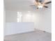 Upstairs loft featuring neutral carpet, natural light, and open space at 26 Twin Birch Dr, Angier, NC 27501