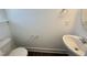 A clean, simple powder room features a pedestal sink and updated fixtures at 26 Twin Birch Dr, Angier, NC 27501