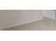 This carpeted bedroom offers ample natural light and a clean, modern feel at 261 Umstead St, Sanford, NC 27330