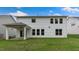 The home has a spacious backyard and a covered patio at 261 Umstead St, Sanford, NC 27330