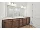 Bathroom featuring a double vanity with quartz countertops and modern lighting at 273 Marvel Dr # 139, Rolesville, NC 27571