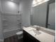 Bathroom featuring a modern vanity, sink, mirror and a shower-tub combo at 273 Marvel Dr # 139, Rolesville, NC 27571