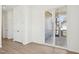 Bright bedroom with a sliding glass door leading to a covered patio and two doors at 273 Marvel Dr # 139, Rolesville, NC 27571