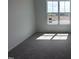 Bedroom with natural light coming through a window at 273 Marvel Dr # 139, Rolesville, NC 27571