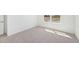 Bedroom featuring neutral carpet, ample natural light, and bright view at 273 Marvel Dr # 139, Rolesville, NC 27571