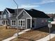 Beautiful home featuring gray siding, white trim, well-manicured lawn, and street views at 273 Marvel Dr # 139, Rolesville, NC 27571