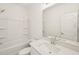 Bright bathroom features a tub-shower combo and quartz countertops at 2880 Quarry Rd # 163, Rolesville, NC 27571
