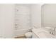 Bright bathroom features a tub-shower combo and quartz countertops at 2880 Quarry Rd # 163, Rolesville, NC 27571