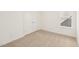 Bright, carpeted bedroom features a double-door closet and window with blinds at 2880 Quarry Rd # 163, Rolesville, NC 27571