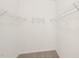 Walk-in closet with carpet and built-in shelving for optimal storage at 2880 Quarry Rd # 163, Rolesville, NC 27571