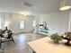 Inviting living room showcasing modern decor, a staircase, and ample natural light at 2880 Quarry Rd # 163, Rolesville, NC 27571