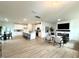 Open concept living and kitchen area with modern finishes and stylish decor at 2880 Quarry Rd # 163, Rolesville, NC 27571