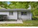 Charming single-story home with light gray siding, updated windows, and a well-kept front yard at 292 Cedar Lake Rd # A, Chapel Hill, NC 27516