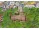 Aerial view of the property showcasing its location surrounded by lush greenery and neighborhood at 308 Summerfield Crossing Road, Chapel Hill, NC 27514