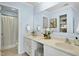 Bright bathroom with double sinks, vanity, and updated shower at 308 Summerfield Crossing Road, Chapel Hill, NC 27514