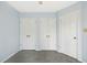 Neutral bedroom with multiple closets for storage at 308 Summerfield Crossing Road, Chapel Hill, NC 27514