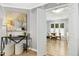 Elegant entry leads to a well-lit dining room with traditional furnishings at 308 Summerfield Crossing Road, Chapel Hill, NC 27514