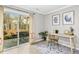 Bright home office boasts natural light, a sleek desk, and peaceful outdoor view at 308 Summerfield Crossing Road, Chapel Hill, NC 27514