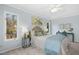 Comfortable main bedroom featuring two windows and a ceiling fan at 308 Summerfield Crossing Road, Chapel Hill, NC 27514