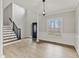Spacious foyer features wood floors, high ceilings, staircase and lots of natural light at 309 Neuse Ridge Dr, Clayton, NC 27527