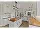 Well-lit kitchen boasts wood countertops, stainless steel appliances and pendant lighting at 309 Neuse Ridge Dr, Clayton, NC 27527