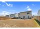 Large, fenced backyard providing privacy with a patio and plenty of space at 3413 Dragonfly River Ct, Raleigh, NC 27604
