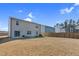 Spacious backyard with privacy fence, perfect for outdoor activities at 3413 Dragonfly River Ct, Raleigh, NC 27604