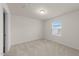 Bright bedroom featuring neutral walls, plush carpeting, and ample natural light at 3413 Dragonfly River Ct, Raleigh, NC 27604