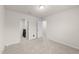 View of bedroom with open doorway, neutral carpet, and light colored walls at 3413 Dragonfly River Ct, Raleigh, NC 27604