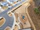 Aerial view of neighborhood playground with benches and equipment at 3413 Dragonfly River Ct, Raleigh, NC 27604