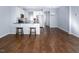 Spacious living room with hardwood floors, an open layout, and natural light at 345 Rubrum Dr, Hillsborough, NC 27278