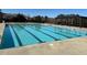 Enjoy this community pool with marked lanes and an adjacent pergola, perfect for a relaxing day at 345 Rubrum Dr, Hillsborough, NC 27278