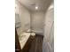 Cozy full bath with a shower-tub combination, a single sink vanity, and a mirrored medicine cabinet at 3520 Ivy Commons Dr # 302, Raleigh, NC 27606