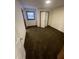 Cozy bedroom with carpet flooring, closet, and a window at 3520 Ivy Commons Dr # 302, Raleigh, NC 27606