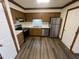 Modern kitchen featuring stainless steel appliances, white countertops and ample cabinet space at 3520 Ivy Commons Dr # 302, Raleigh, NC 27606