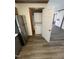 Convenient laundry area with stacked washer and dryer, and updated flooring at 3520 Ivy Commons Dr # 302, Raleigh, NC 27606
