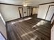 Spacious living room featuring updated flooring, and classic trim throughout at 3520 Ivy Commons Dr # 302, Raleigh, NC 27606