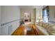 Comfortable living room with hardwood floors, classic trim, and a bright window offering natural light and a view at 3560 Nc 98, Youngsville, NC 27596