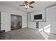 Bonus room featuring built in shelving and a TV at 3916 Bostwyck Dr, Fuquay Varina, NC 27526