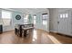 Elegant dining area with modern lighting and large windows for natural light at 3916 Bostwyck Dr, Fuquay Varina, NC 27526