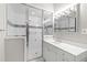 Bathroom features glass shower, modern vanity, and decorative tiling at 400 Tharps Ln, Raleigh, NC 27614