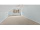 Bright bedroom with neutral carpet, natural light, and ample space at 400 Tharps Ln, Raleigh, NC 27614
