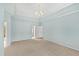 Spacious main bedroom features tray ceilings and multiple entryways at 400 Tharps Ln, Raleigh, NC 27614