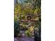 Backyard pond featuring custom landscaping and decorative art, a relaxing backyard feature at 402 Westwood Dr, Chapel Hill, NC 27516