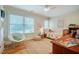 Bedroom featuring hardwood floors, a comfortable bed, and natural light at 402 Westwood Dr, Chapel Hill, NC 27516