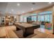 Inviting game room with a pool table, bar area, and a seamless transition to the living space at 402 Westwood Dr, Chapel Hill, NC 27516
