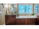 Bright bathroom featuring double vanities, soaking tub, and ample natural light at 402 Westwood Dr, Chapel Hill, NC 27516