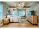 Bright main bedroom with modern decor, wood floors, and coffered ceilings at 402 Westwood Dr, Chapel Hill, NC 27516
